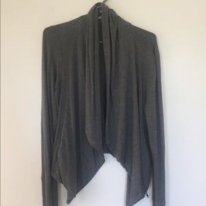 Draping sweater with half zipper and cowled neck.